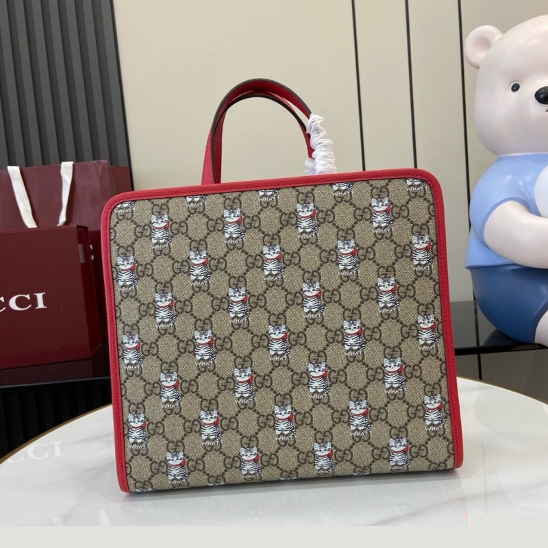 G*u*i shopping bags